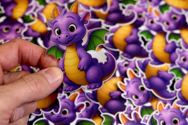 Purple dragon stickers with a hand holding one sticker