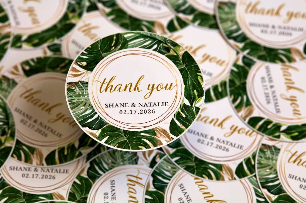 Collection of personalized 'thank you' stickers with leaf designs and text.
