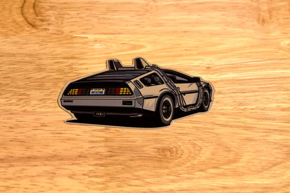 Silver chrome delorean sticker.